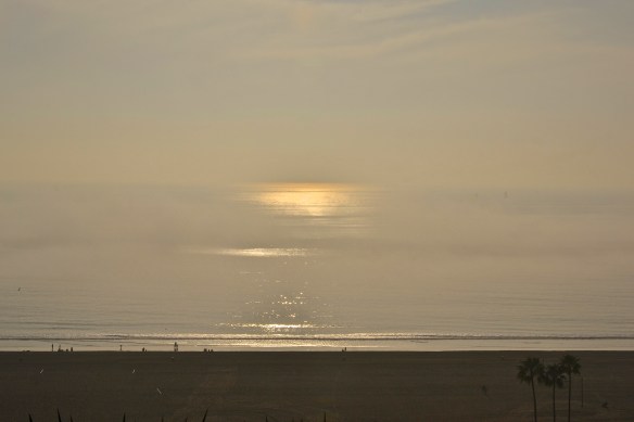 Sailboats peak through the thick fog covering the Santa Monica Bay, CA.